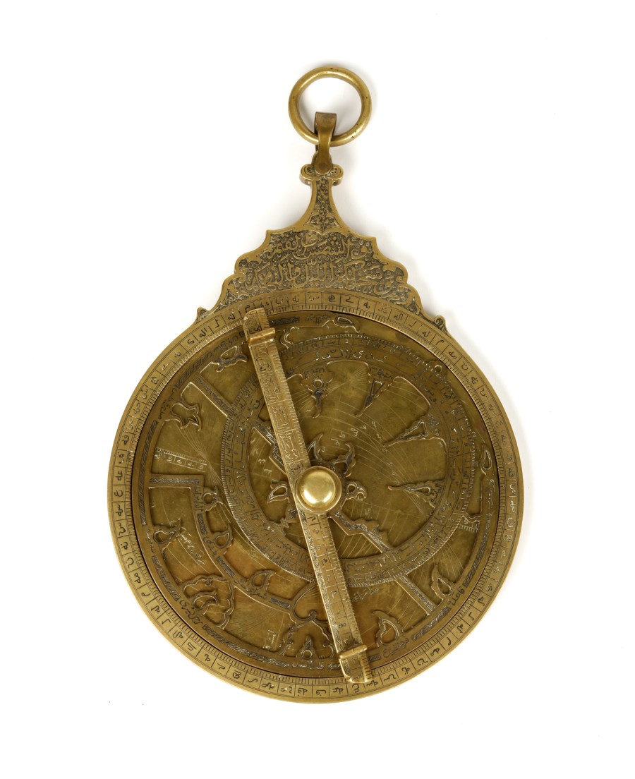 A Persian brass astrolabe 
Iran, late 19th century with a most possibly spurious date 1128 AH (1715 AD) (Arte Islamica )