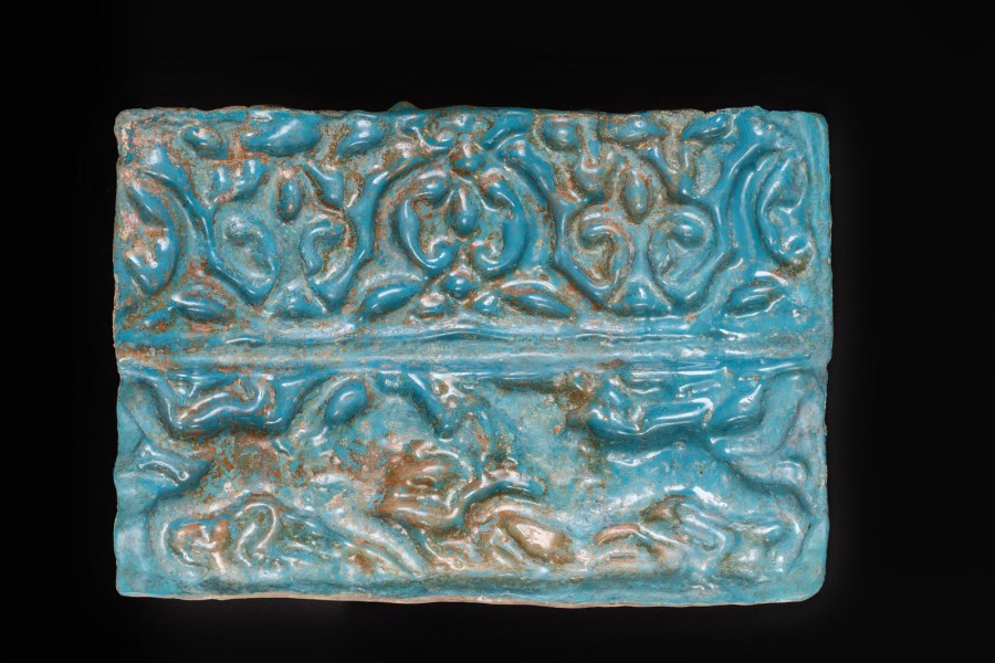 A turquoise glazed Kashan moulded tile 
Iran, 12th-13th century  (Arte Islamica )