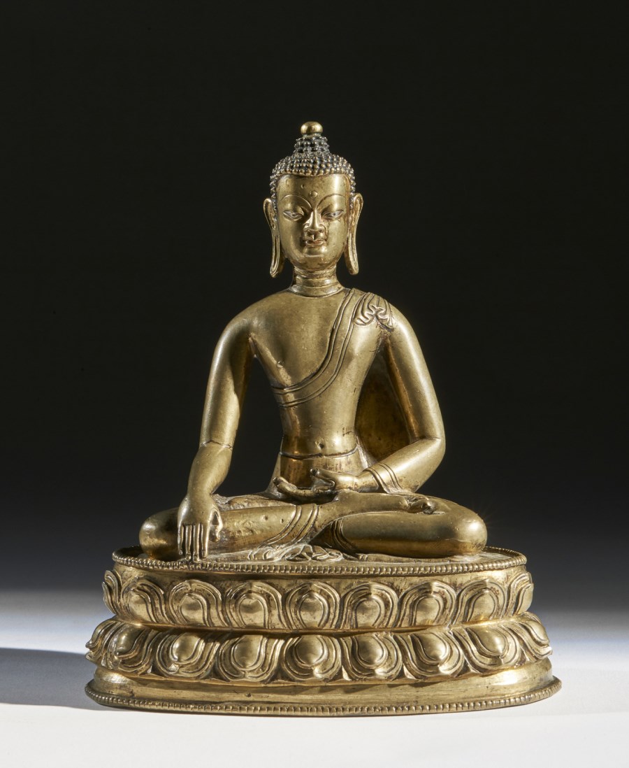 A bronze figure of Buddha Shakyamuni 
Tibet, 13th century  (Arte Himalayana )