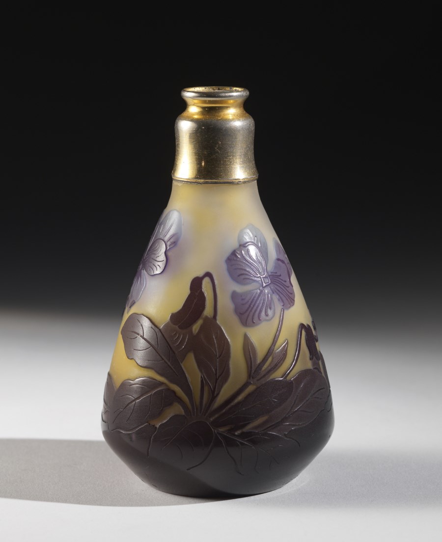 Piriform double glass vase, decoration of violets and leaves in the shades  of Egyptian violet finely etched with acid on a honey-coloured background.  | Gallé