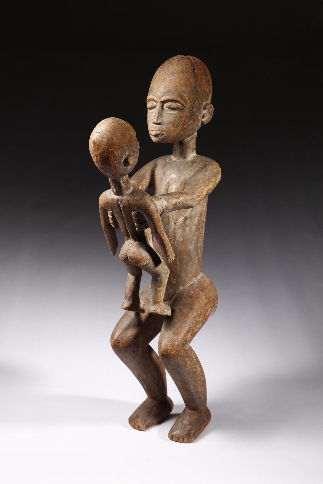 Giovane madre con bimbo
Baulè, Costa d'Avorio
 (Arte Africana )
