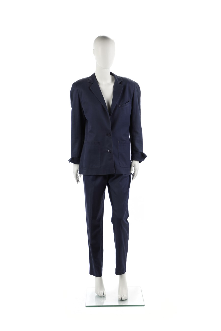 Blue two piece suit with jacket and trousers. (Claude Montana)