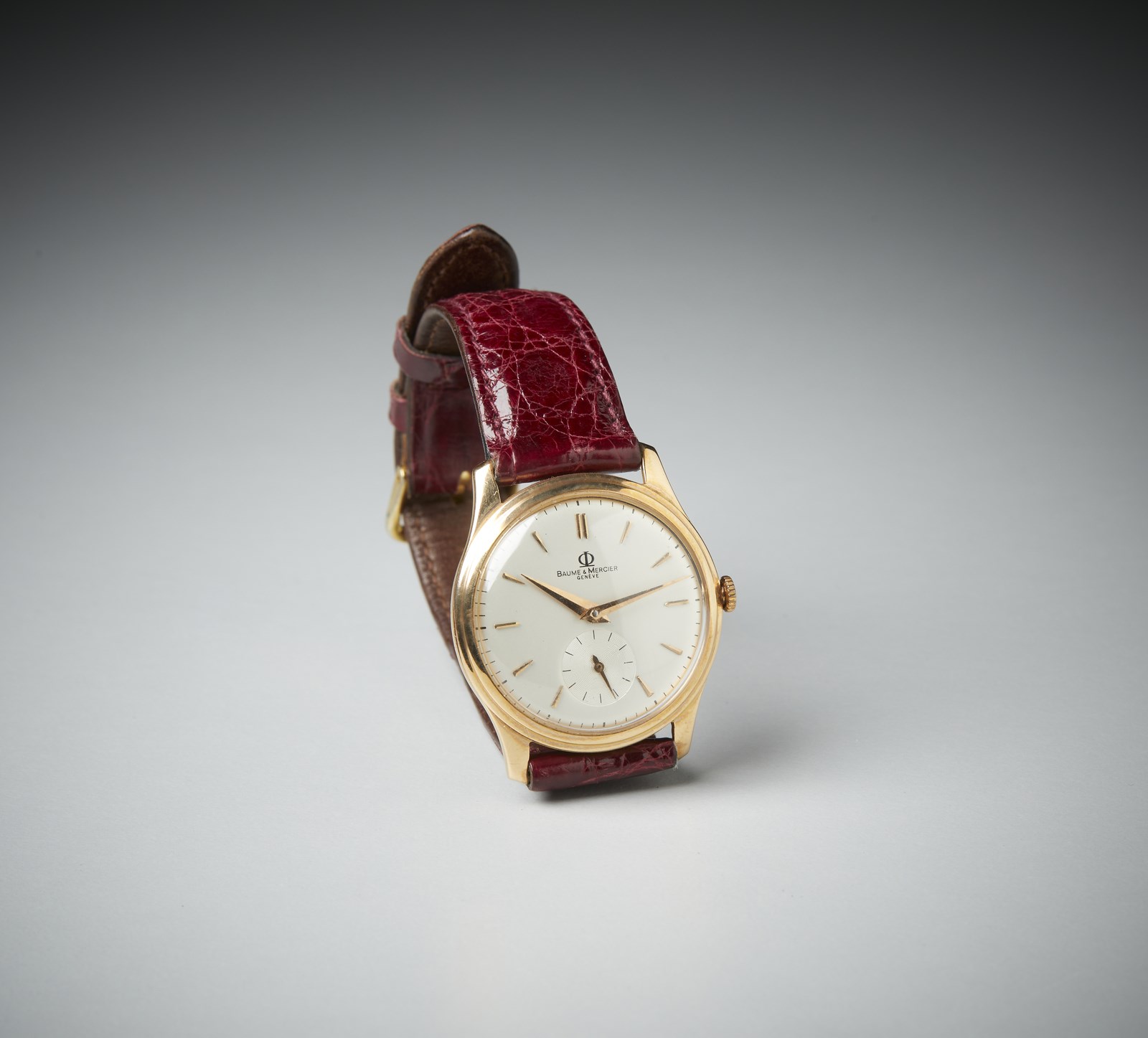 Wristwatch with round case. Yellow gold 750/1000. (Baume & Mercier  )