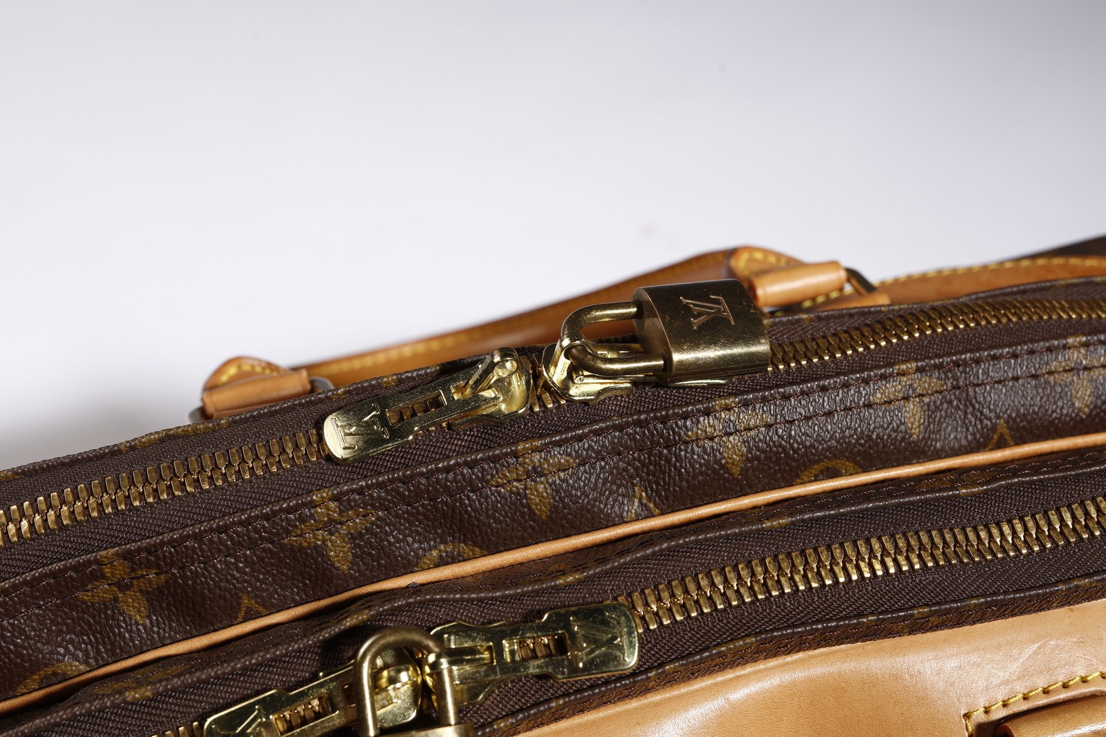 Sold at Auction: Louis Vuitton - a vintage Monogram zipped travel wallet.