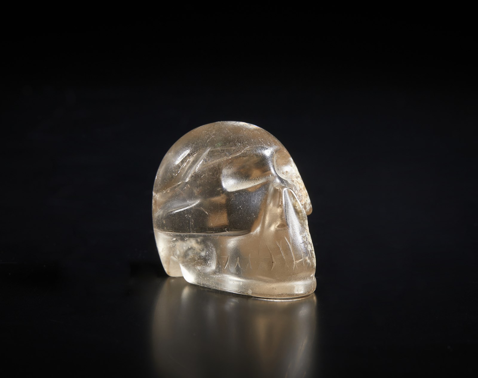 A small rock Crystal vanitas carved as a human skull (. )