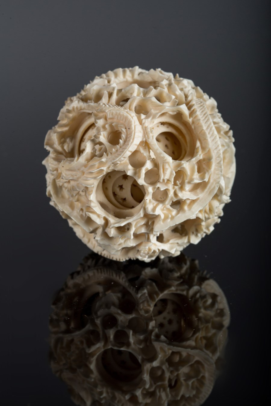 An ivory puzzle ball carved with dragons China, Qing dynasty, 19th ...